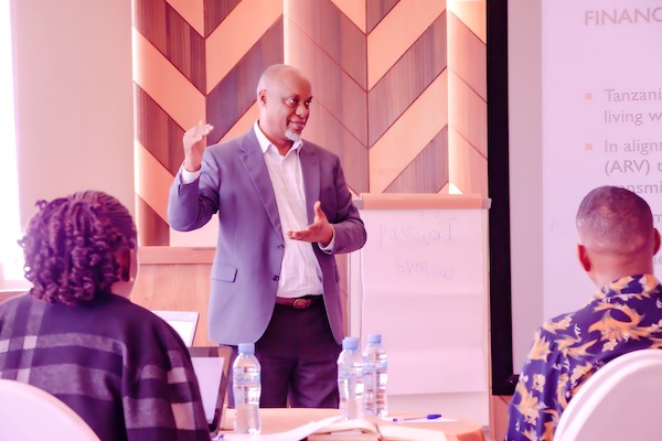 Conducting a workshop with stakeholders to review a draft budget analysis report and develop an HIV advocacy pack for influencing Domestic Resource Mobilization for HIV in the country.